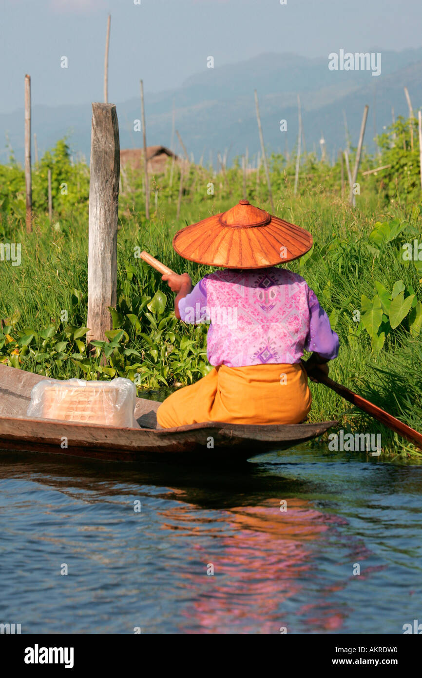 Intha woman in a canoe, Inle Lake, Shan State, Burma, (Myanmar Stock