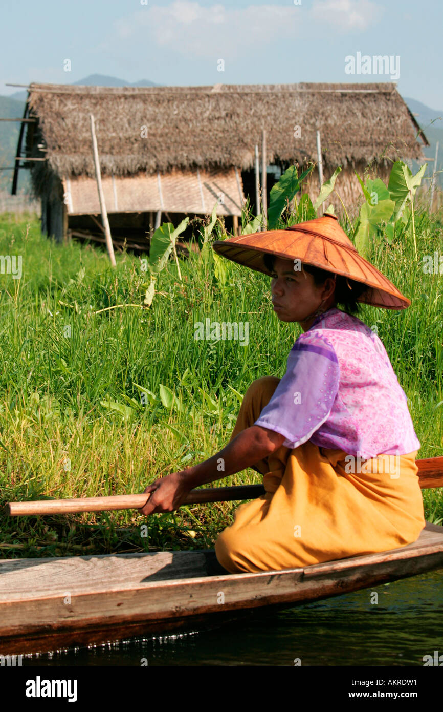 Intha woman in a canoe, Inle Lake, Shan State, Burma, (Myanmar Stock