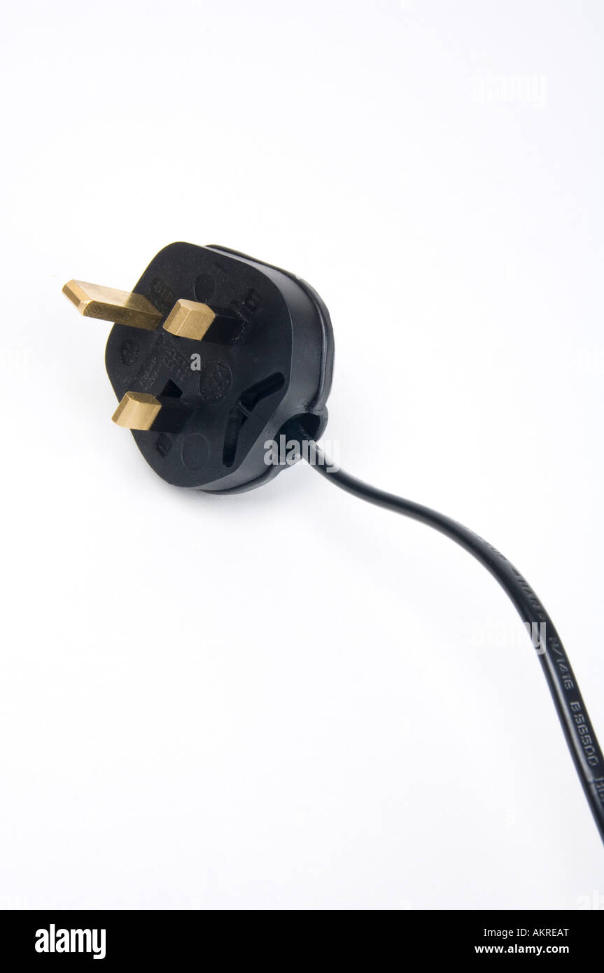 Three pronged electric plugs as used in Britain and Ireland Stock Photo