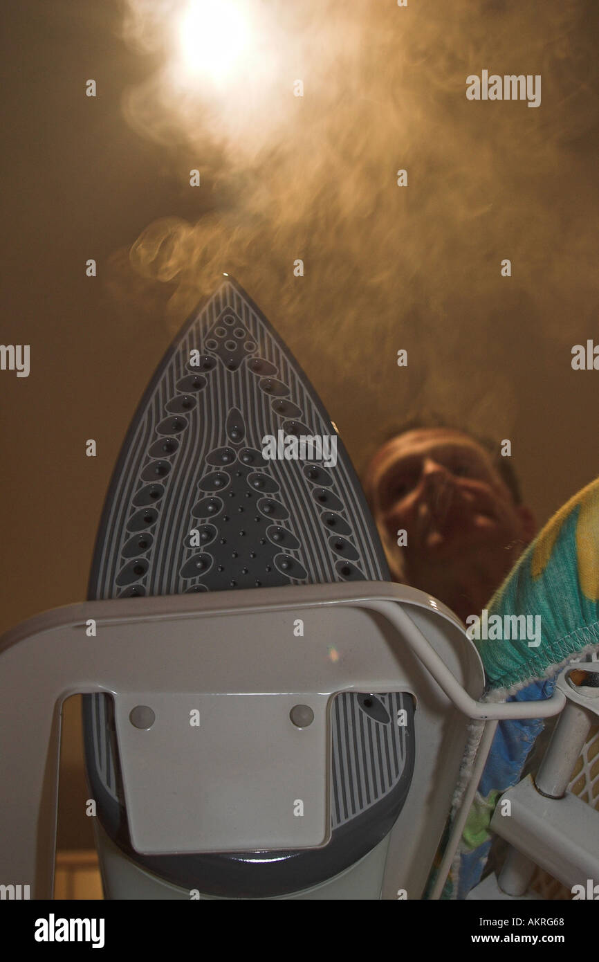 iron with steam coming out of it Stock Photo Alamy