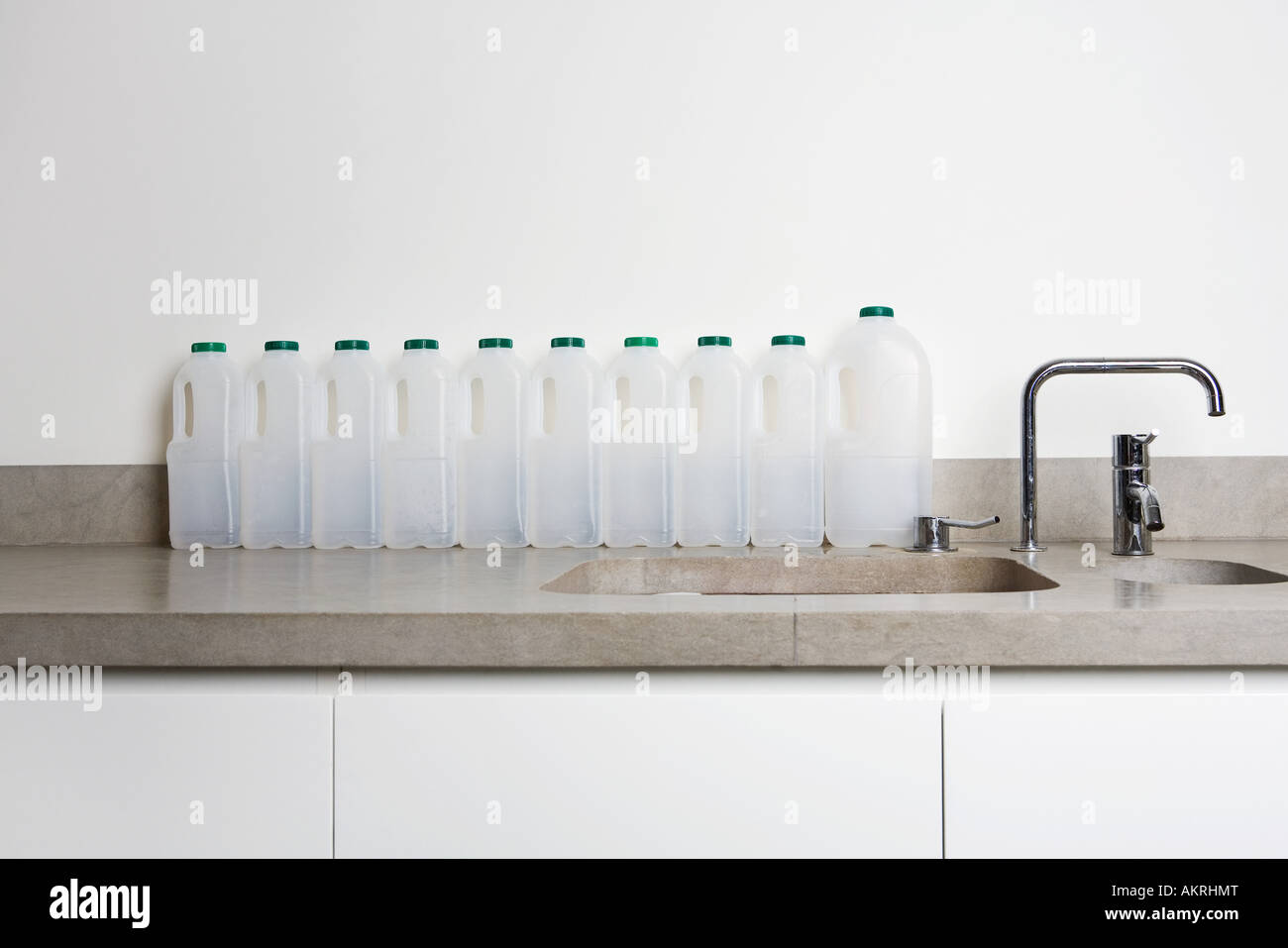 Plastic milk bottles in a row Stock Photo