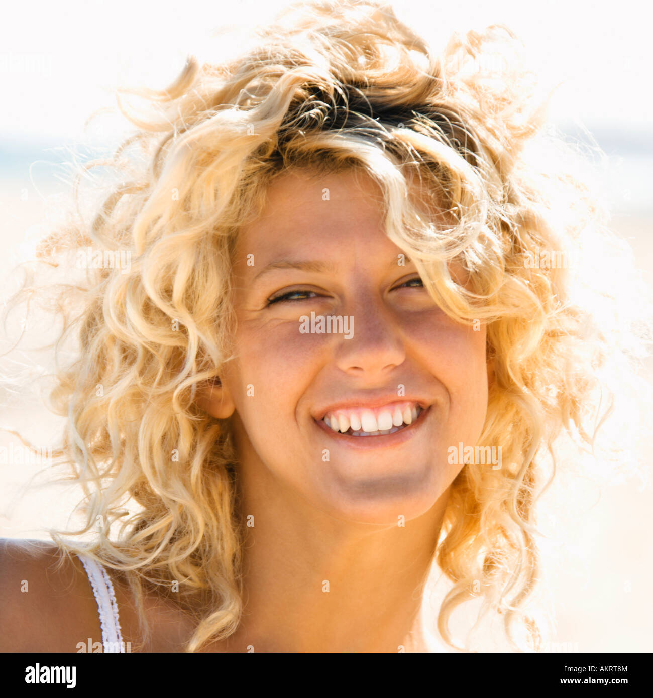 Close up portrait of pretty young blond woman smiling Stock Photo - Alamy
