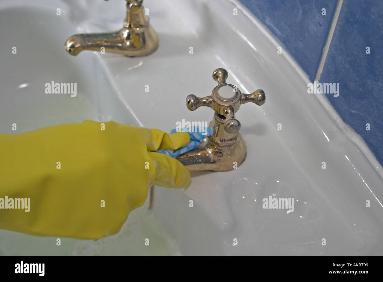 Woman hands bath taps hi-res stock photography and images - Alamy