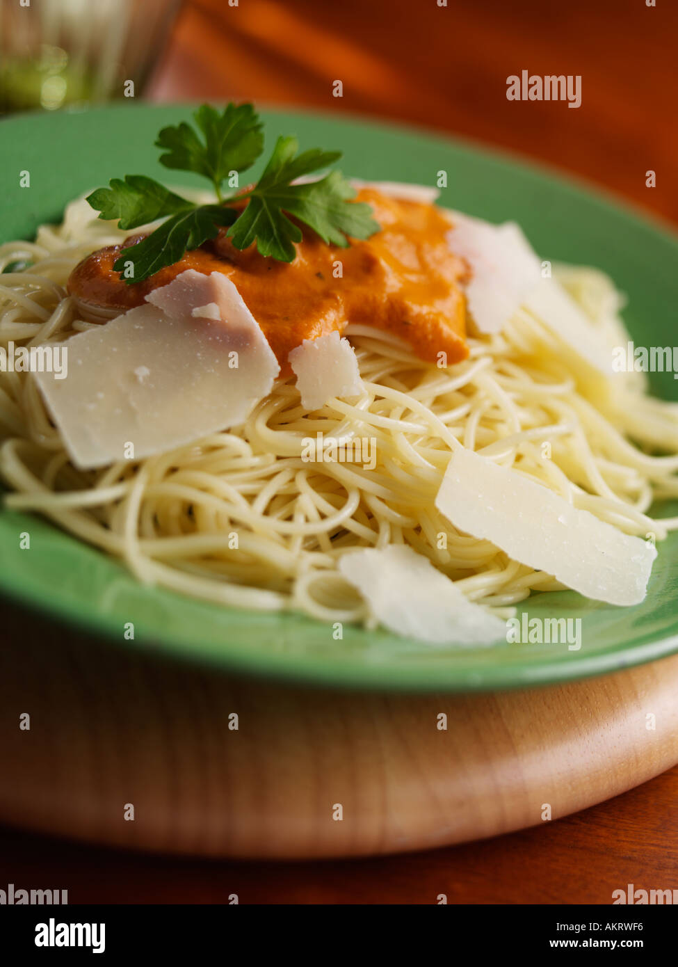 Capellini creamy roast red pepper sauce hi-res stock photography and
