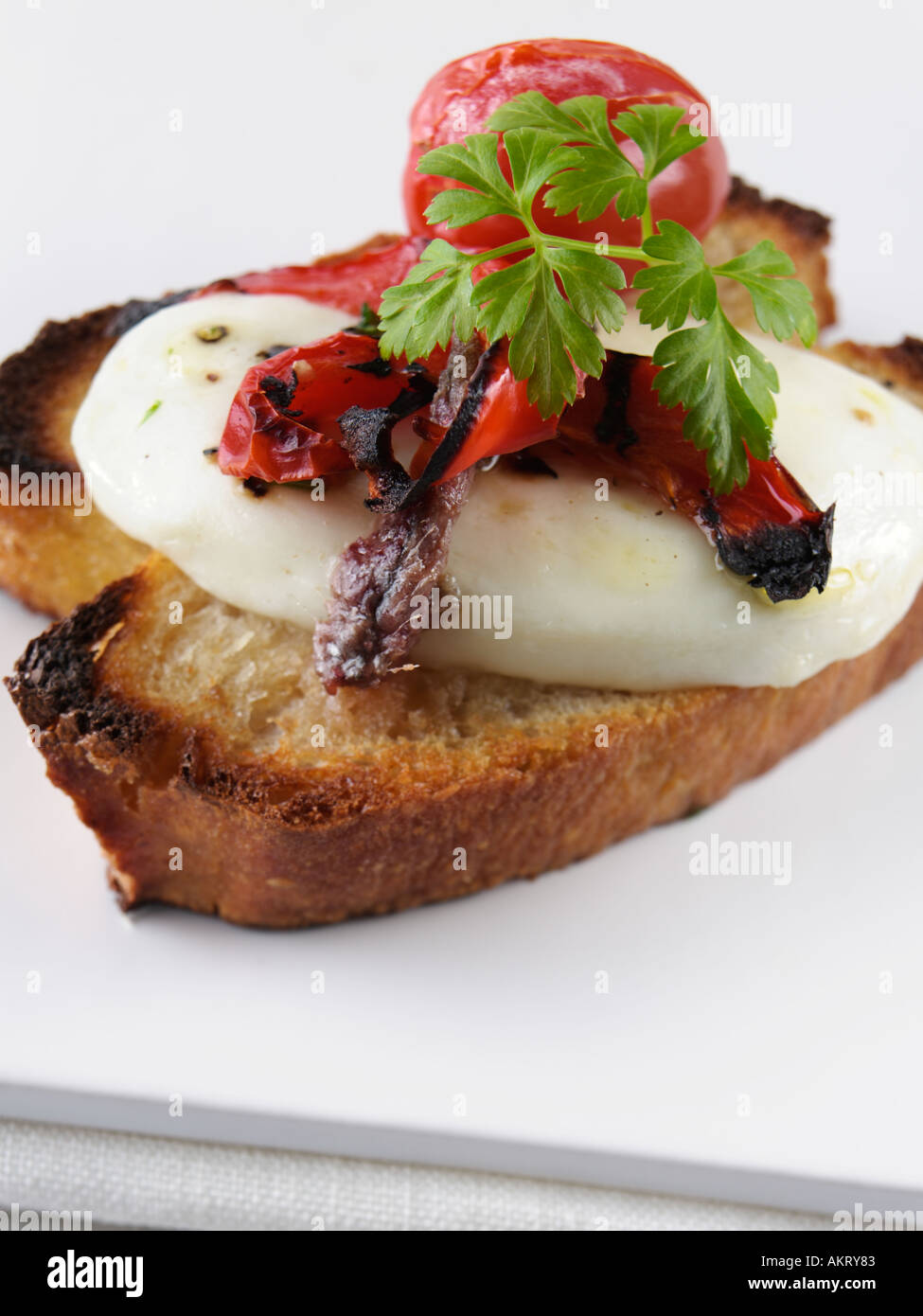 Finger food anchovy mozzarella cheese ciabatta bruschetta hires stock