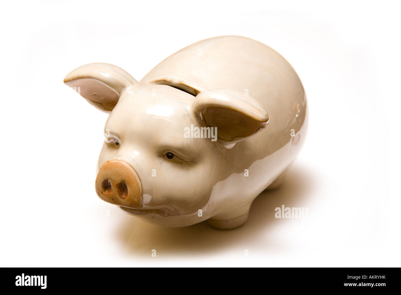 Piggy bank style money box isolated on a white studio background Stock ...