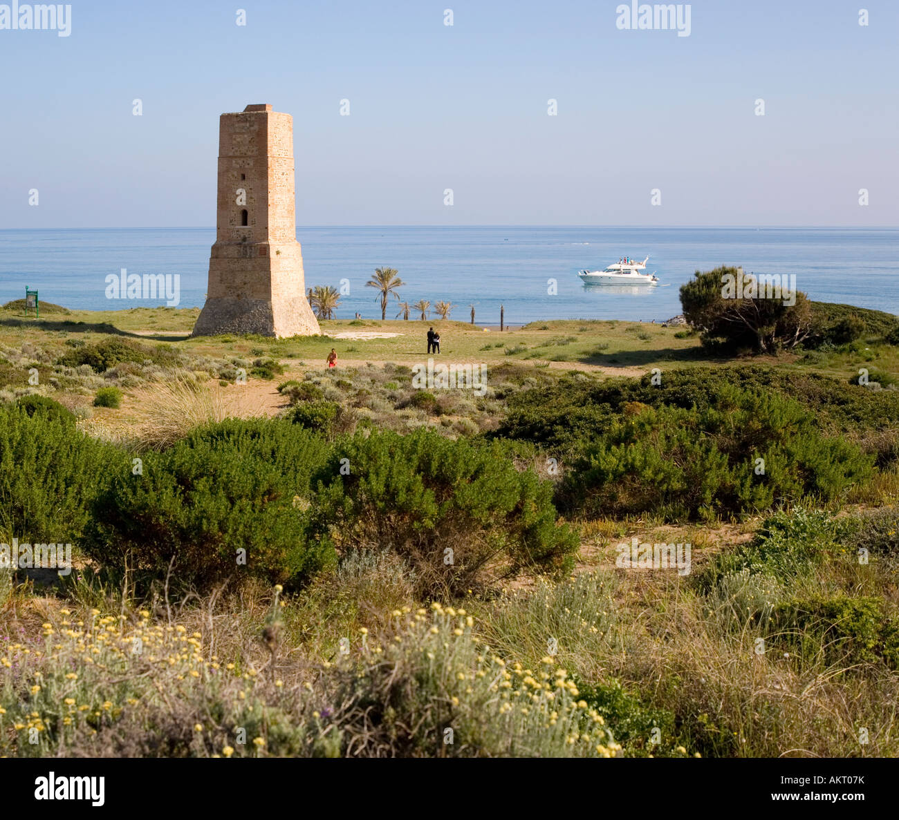 near Marbella Malaga Spain 16th century monument Torre de los Ladrones amongst Artola sand dunes behind Artola Cabopino beach Stock Photo