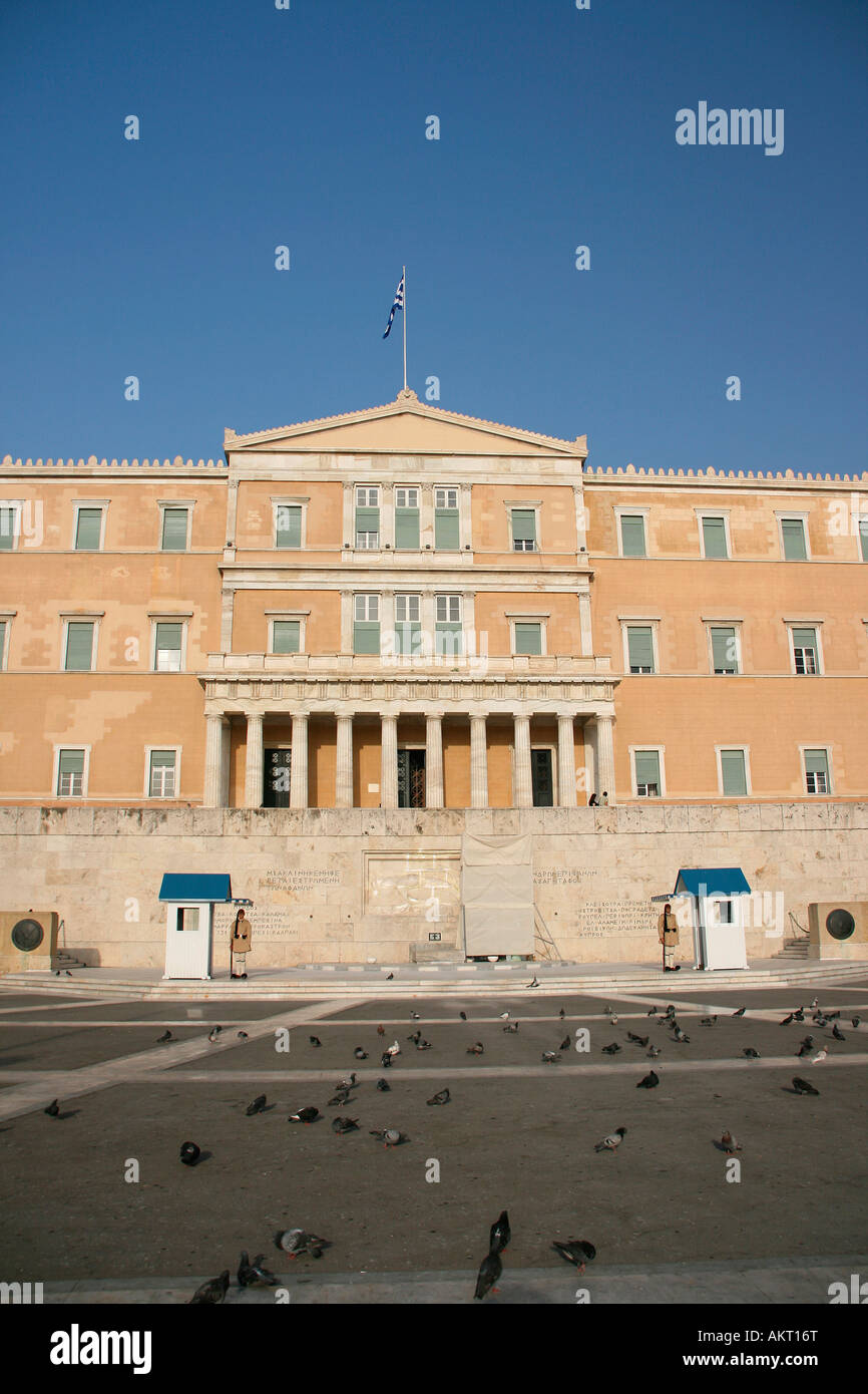 vertical view of greek parliament exterior with pigeons and guards landmakrs of athens greece Stock Photo
