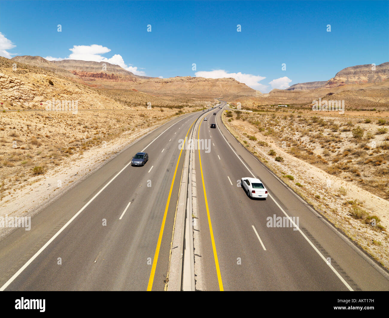 Birds eye view of automobiles on rural desert highway Stock Photo