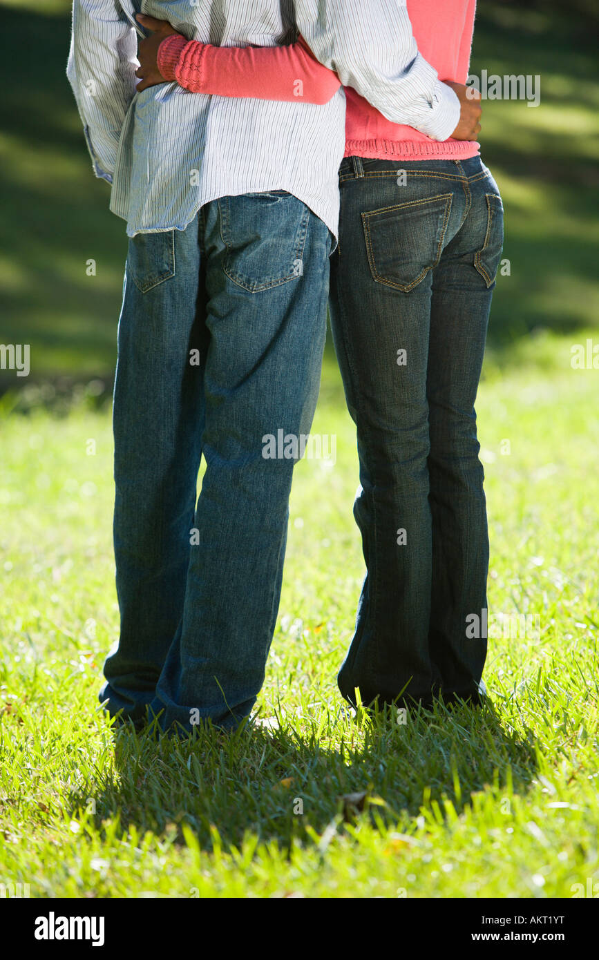 Arms around eachother hi-res stock photography and images - Alamy