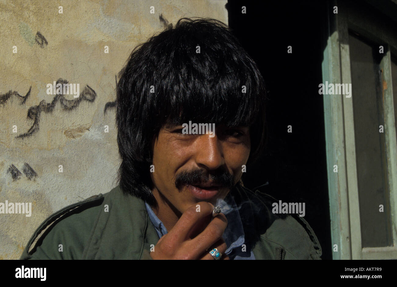 mujahid soldier smoking Kabul Afghanistan Stock Photo