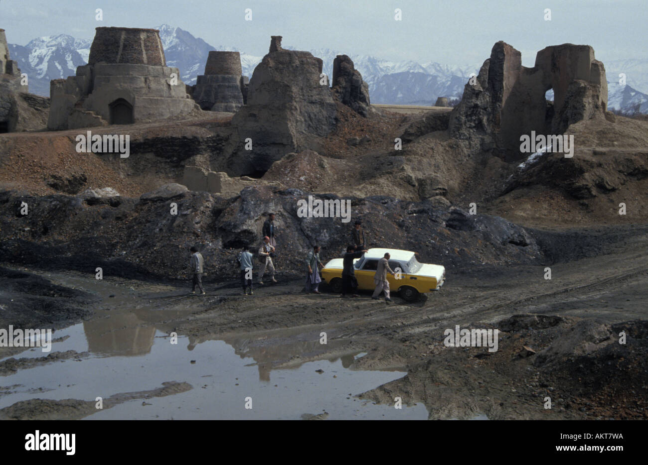 taxi stuck among brick kilns West Kabul Afghanistan Stock Photo