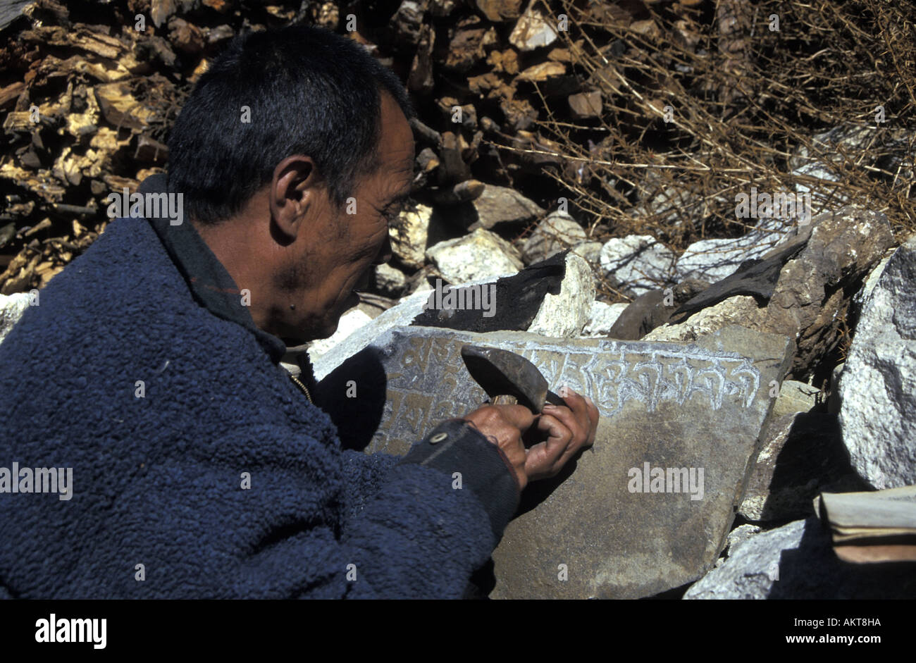 carving mani stones Solu Khumbu Nepal Stock Photo