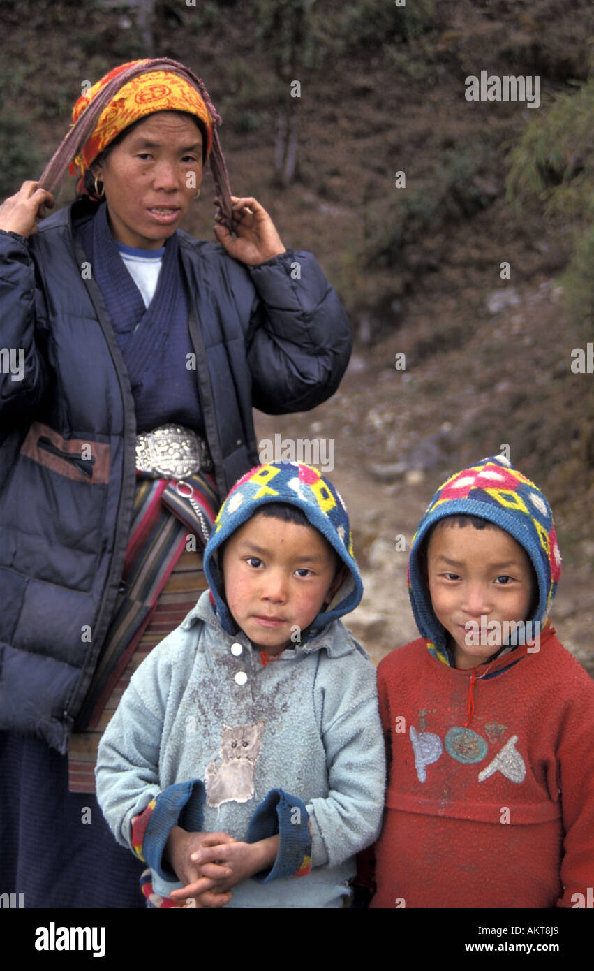 family in forest near Puiyan Everest trail Nepal Stock Photo