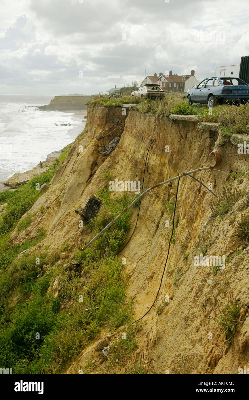Storm waves eroding the cliffs at Happisburgh, Norfolk, UK Stock Photo ...