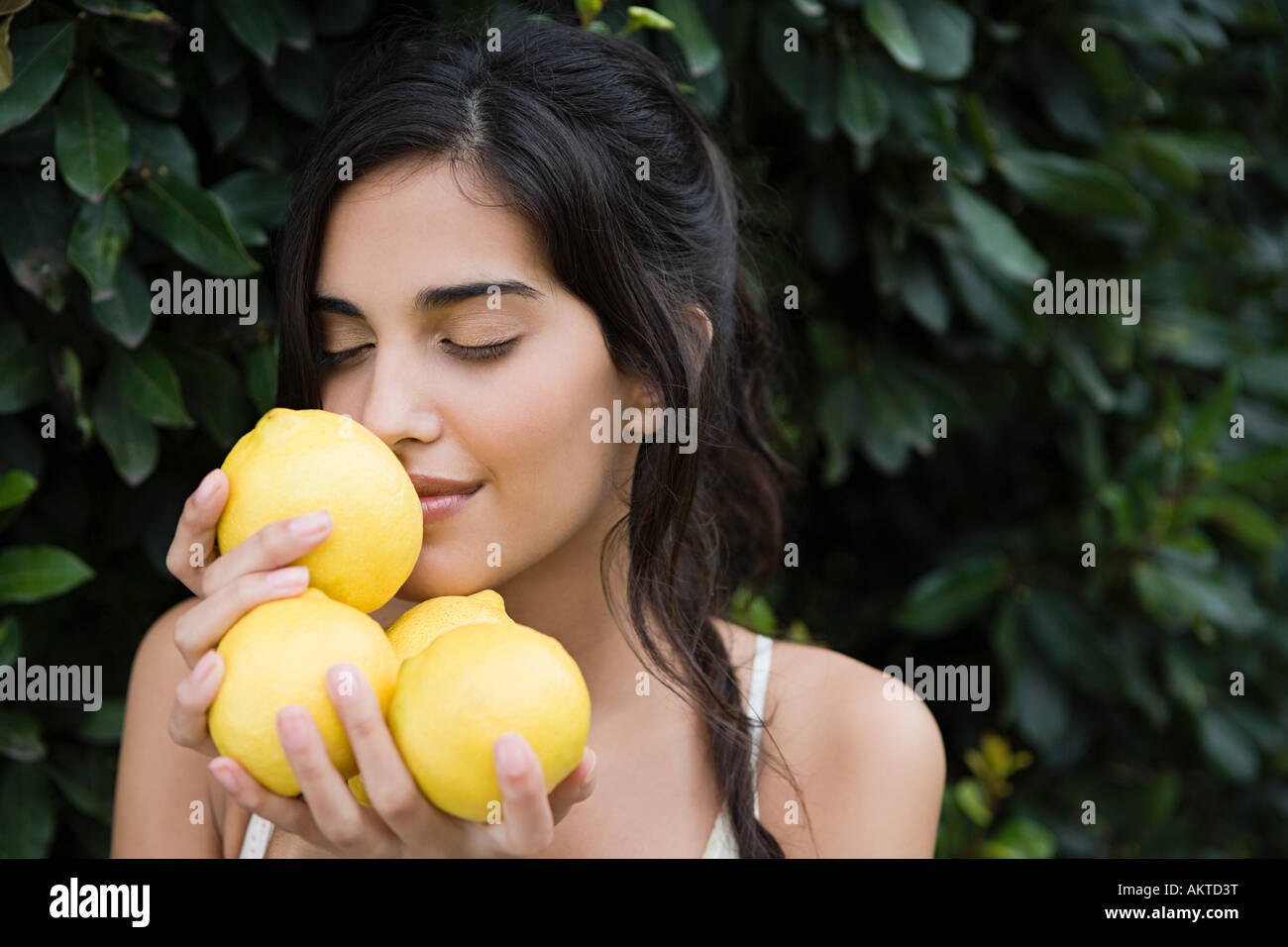 Ethnic woman smell lemon hires stock photography and images Alamy