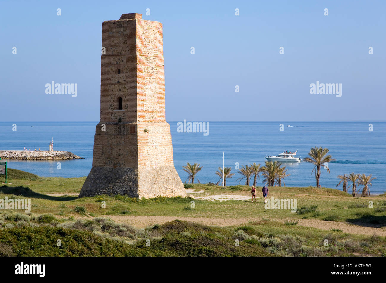 near Marbella Malaga Spain 16th century monument Torre de los Ladrones amongst Artola sand dunes behind Artola Cabopino beach Stock Photo