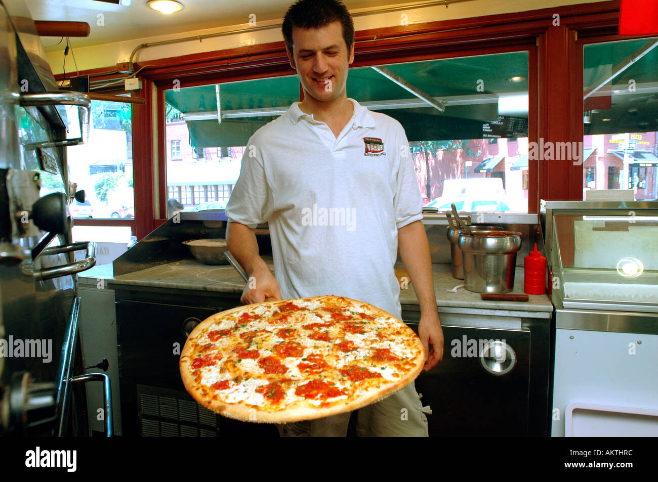Pizza is served at Joe s Pizza in Greenwich Village Stock Photo Alamy