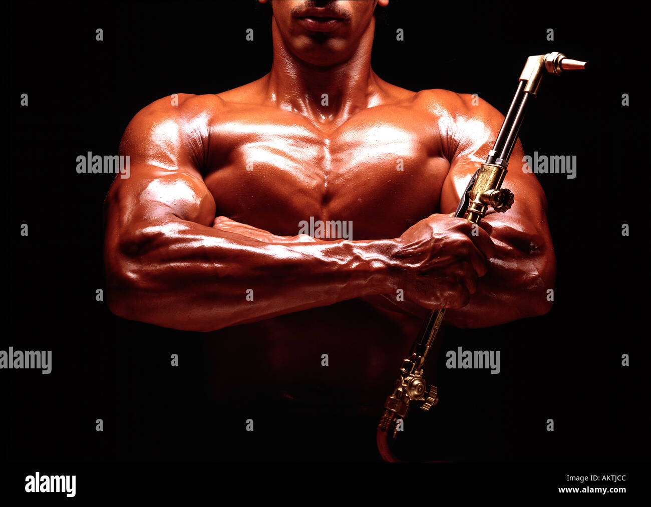 1 one african american male body builder w welding torch copy space Achievement Adaptability Americana Concentration Stock Photo