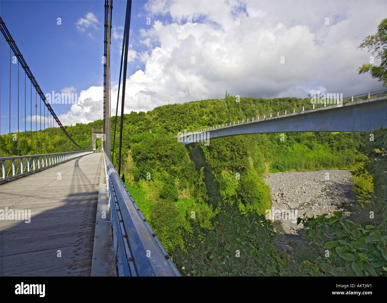 Historic Suspension Bridge with newer replacement on left - Réunion Stock Photo