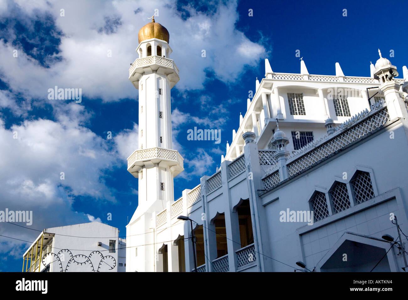 Magnificent Mosque with golden domed minaret in late afternoon sunlight - 'Port Louis', 'Mauritius' Stock Photo