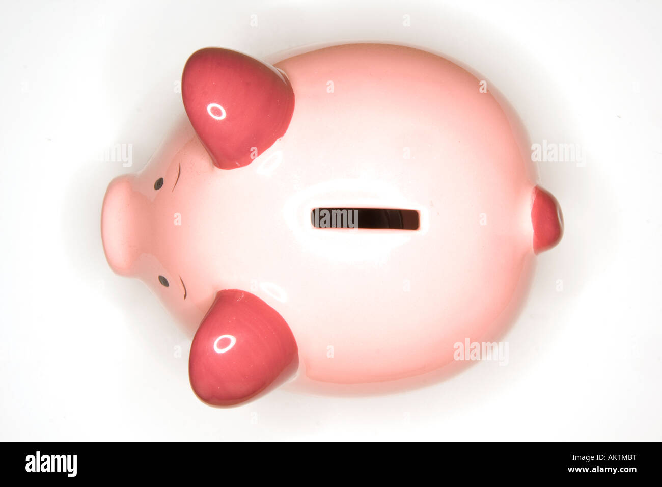Piggy bank style money box isolated on a white studio background Stock ...