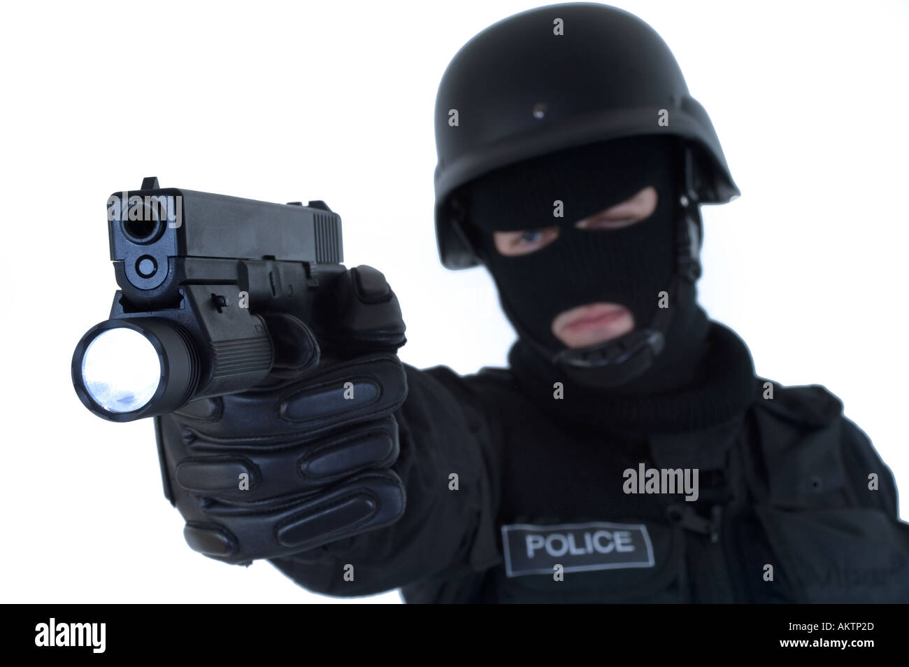 a swat police officer in full uniform with helmet and mp5 machine gun Stock  Photo - Alamy