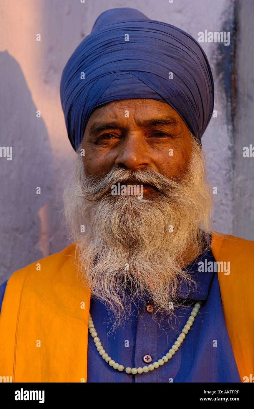 Holy man of Sikh religion. Blue turban within the Sikh religion denotes a Holy man. Bhartpur market. Bharatpur town. Rajasthan Stock Photo