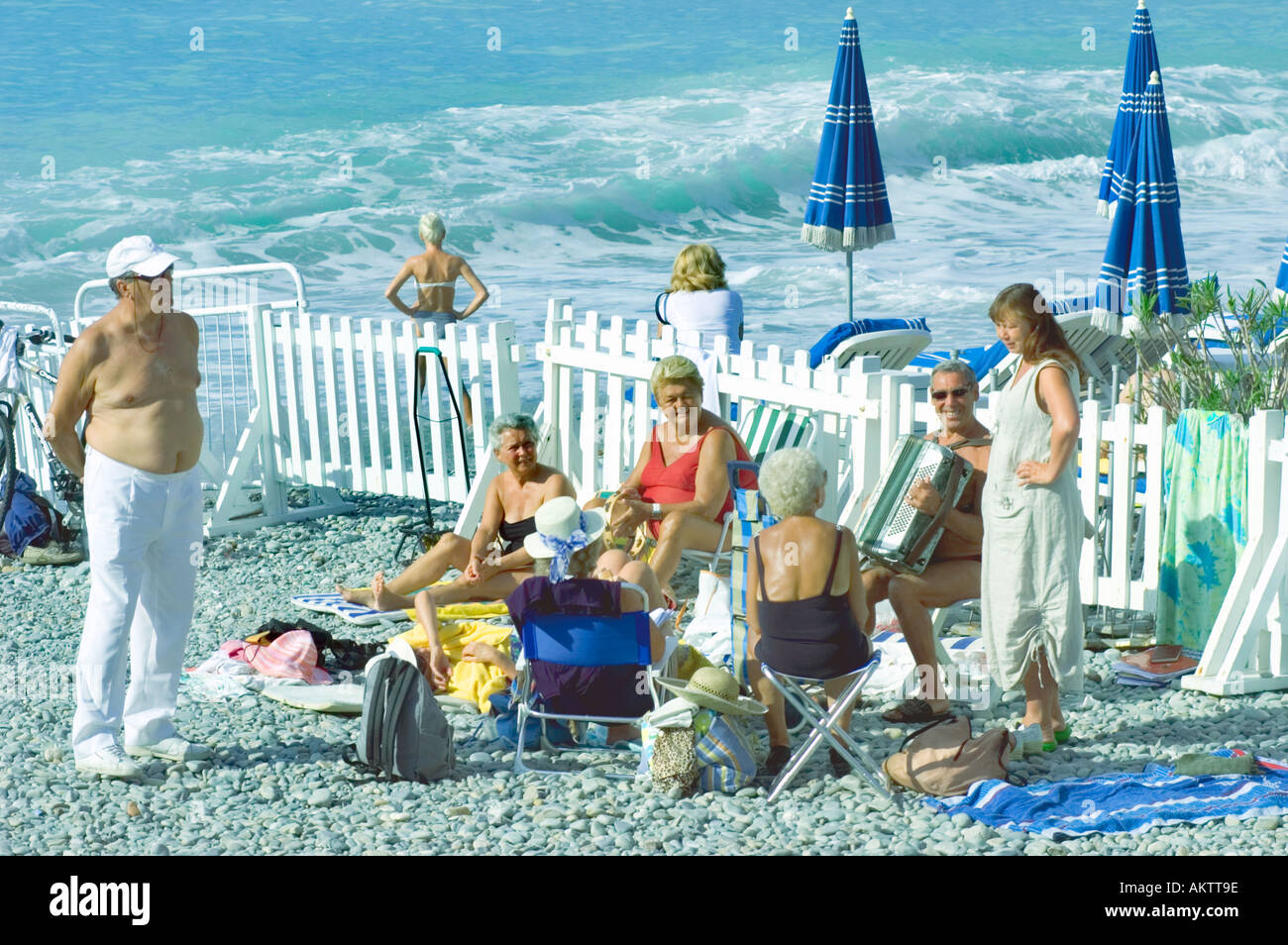 Nice, France, Beach Scene, Group of Senior Adults, Relaxing on Beach