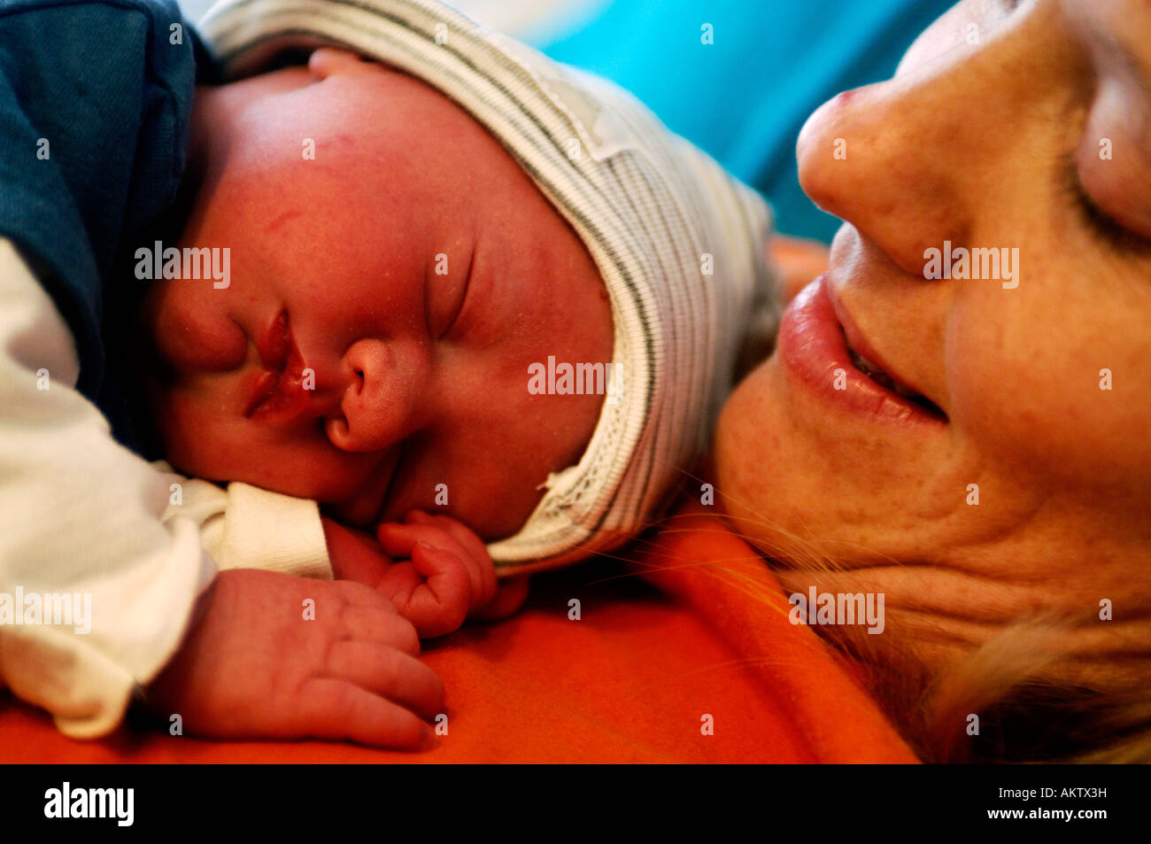 A New Born Baby Boy One Day Old With His Mother Stock Photo Alamy