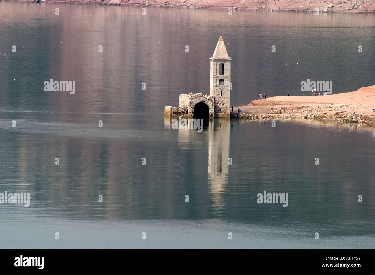 Pantano de Sau Scarcity of water in a Reservoir en Spain In the Water reservoir of Sau people can see the ruins of an old chu Stock Photo