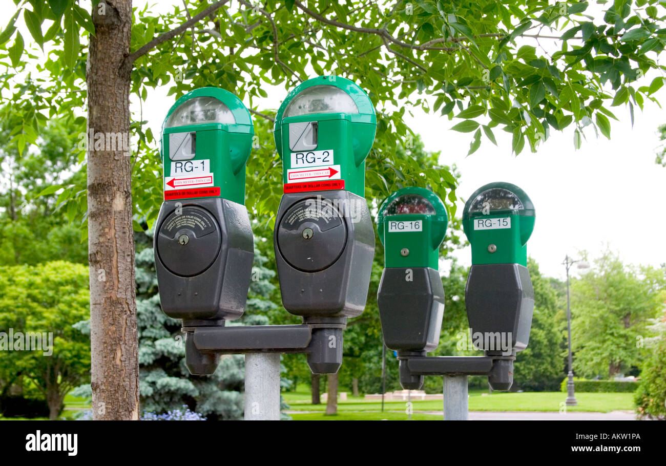 Four parking meters grouped in the Lyndale Park Peace Garden automobile