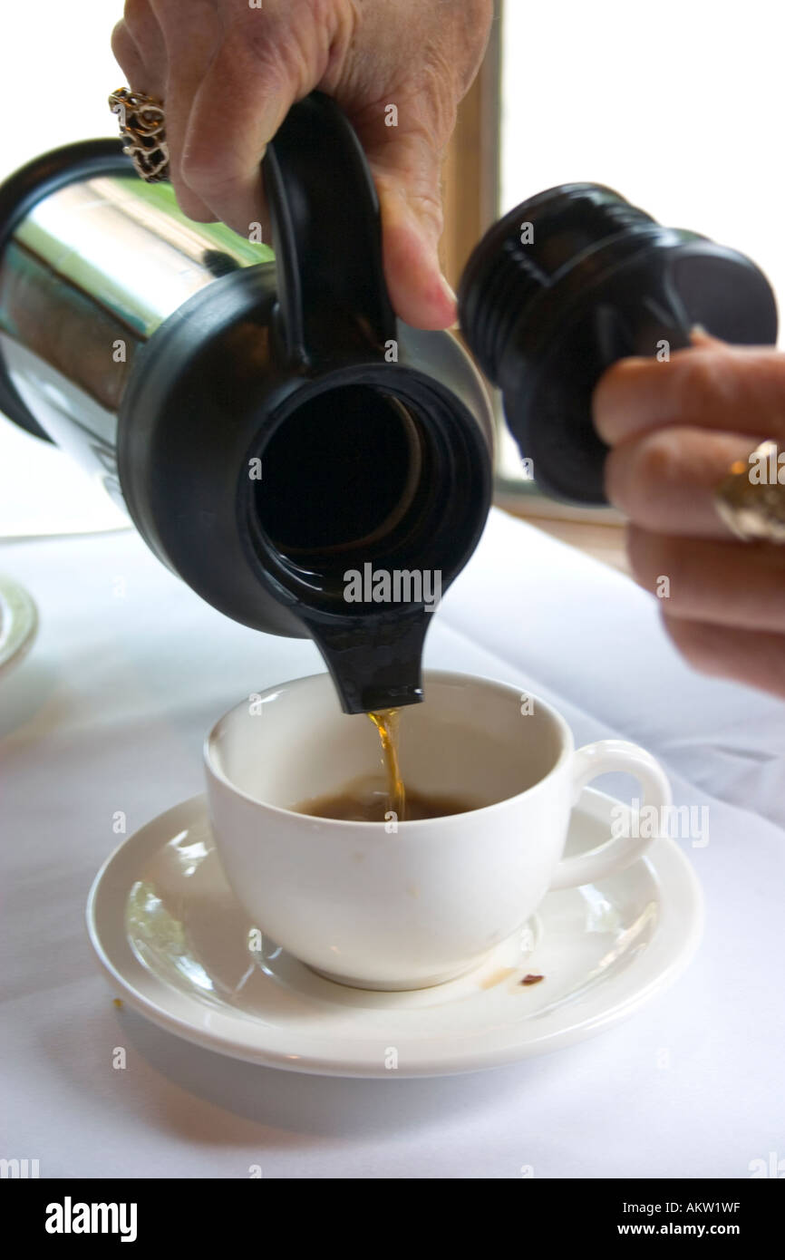 Serving Coffee In The Elegant Nicollet Island Inn Restaurant - 