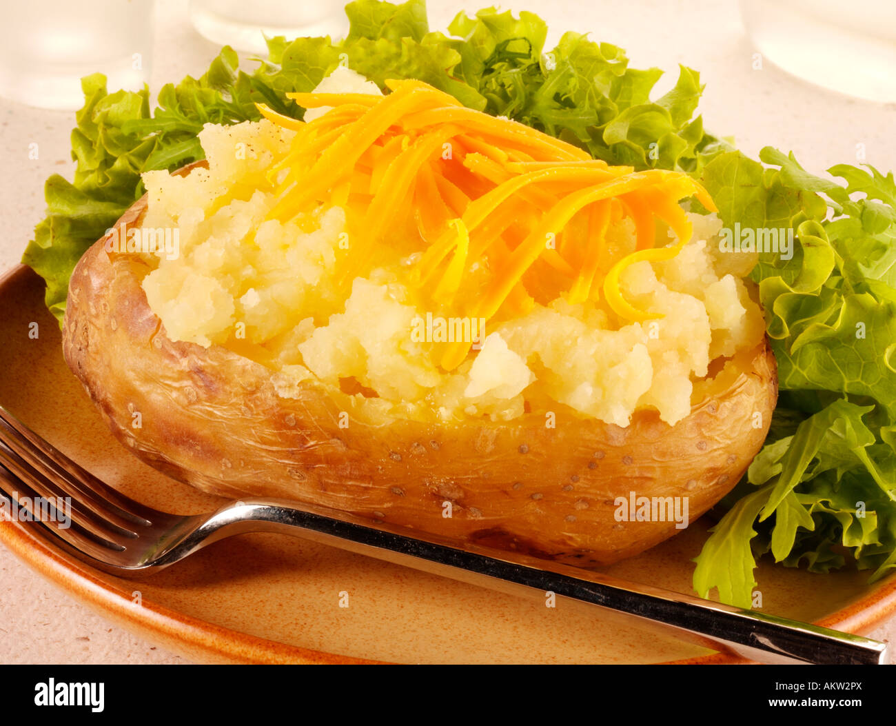 BAKED POTATO WITH CHEESE Stock Photo - Alamy