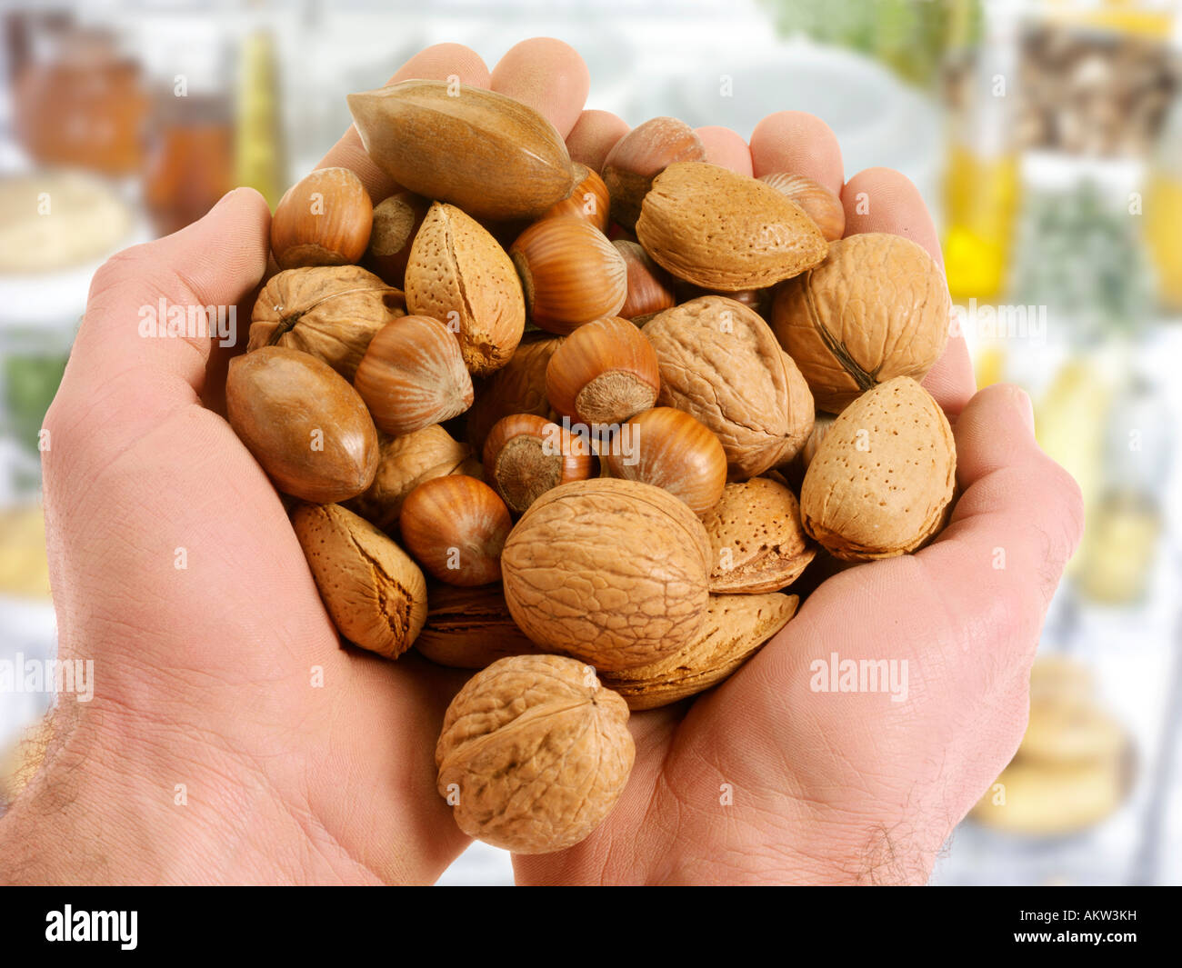 HANDFUL OF MIXED NUTS Stock Photo