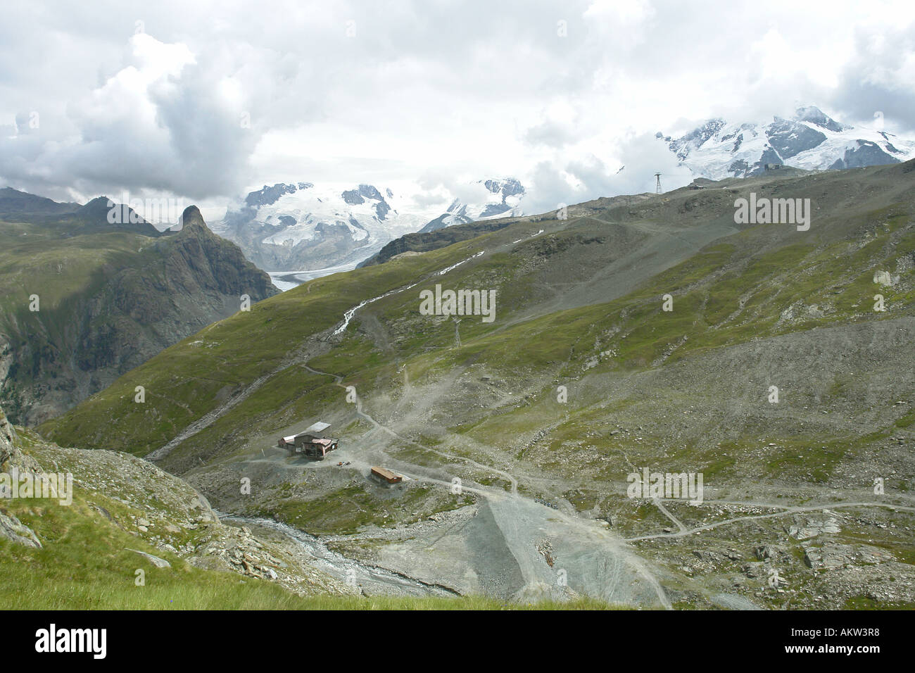 Monte Rosa range of mountains in mist and clouds with Gornergrat to the ...