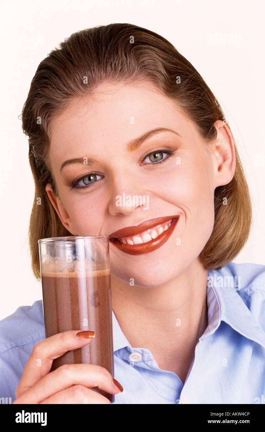 Girl drinking chocolate milk Stock Photo Alamy