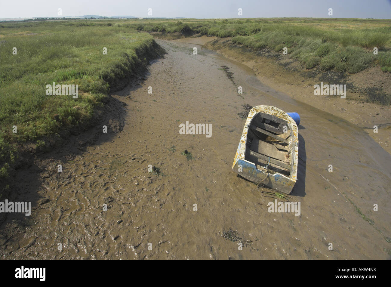 Norfolk tidal creek with boat July Stock Photo Alamy