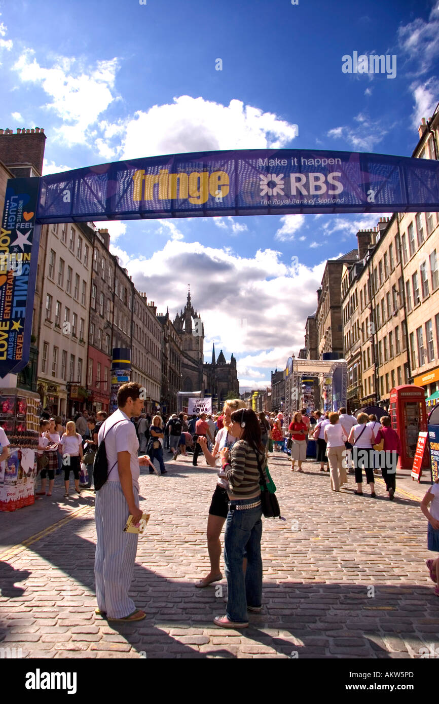 Man being interviewed on The Royal Mile during the Edinburgh Fringe Festival Edinburgh Scotland UK Stock Photo