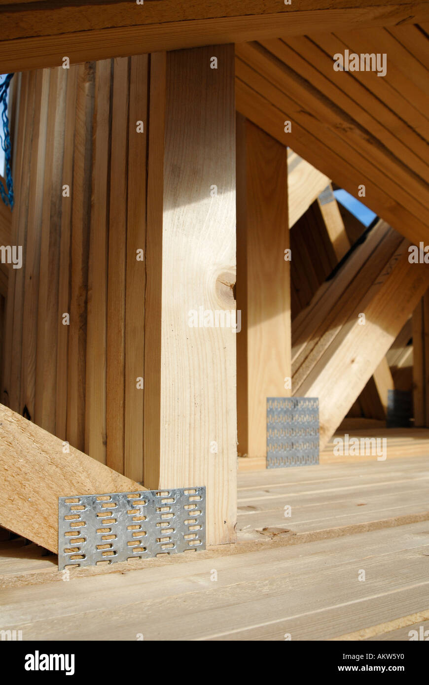 Timber roof joists ready for use on a construction site. England UK