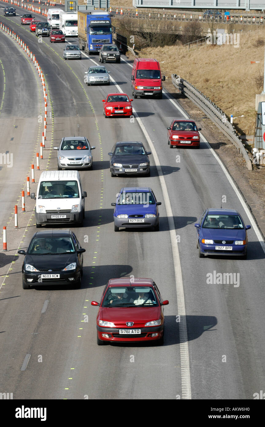 Heavy traffic on the m6 motorway driving through a contraflow system