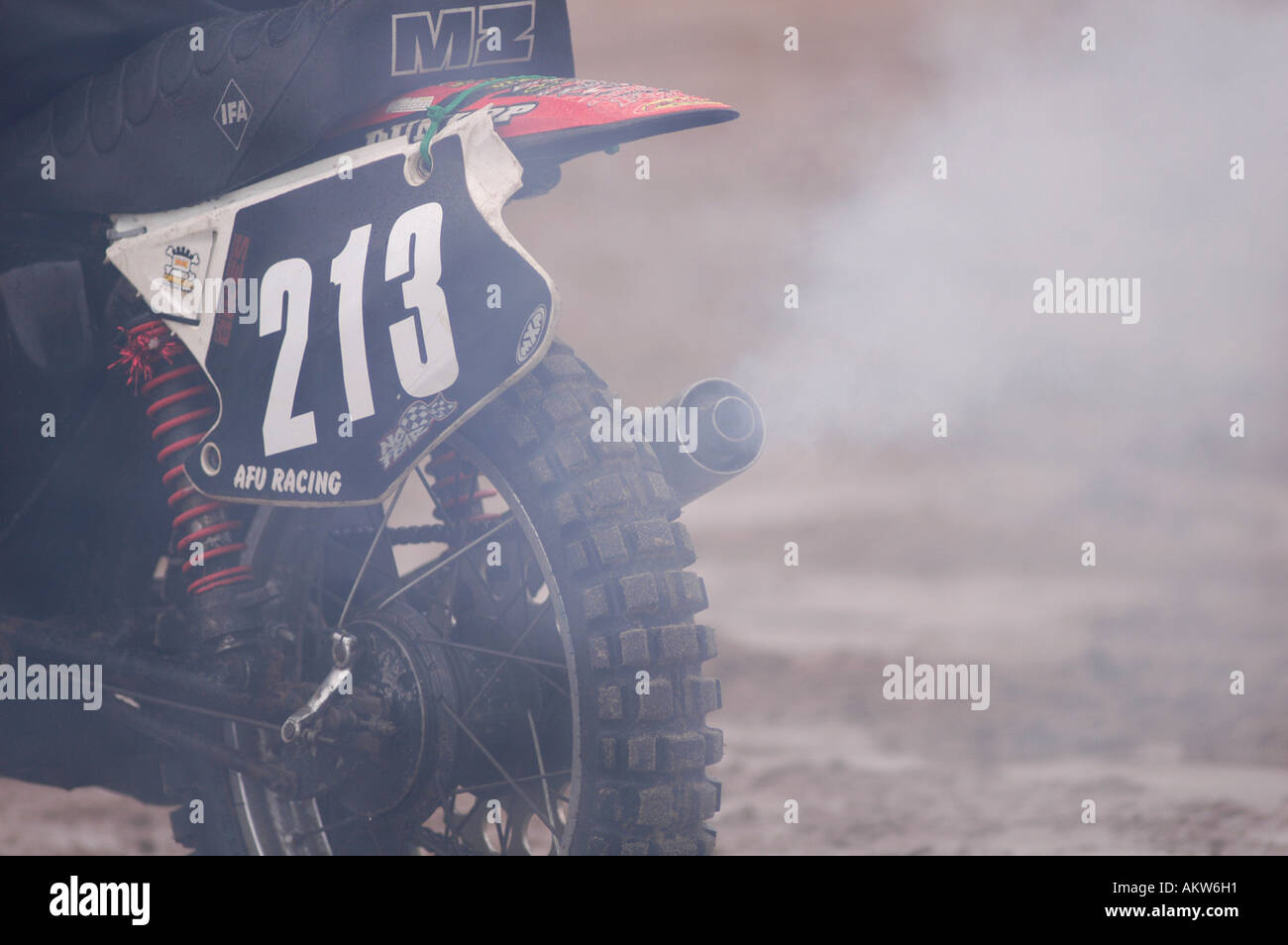 Motorcycle exhaust fumes belching out of a motorbike exhaust pipe Stock Photo