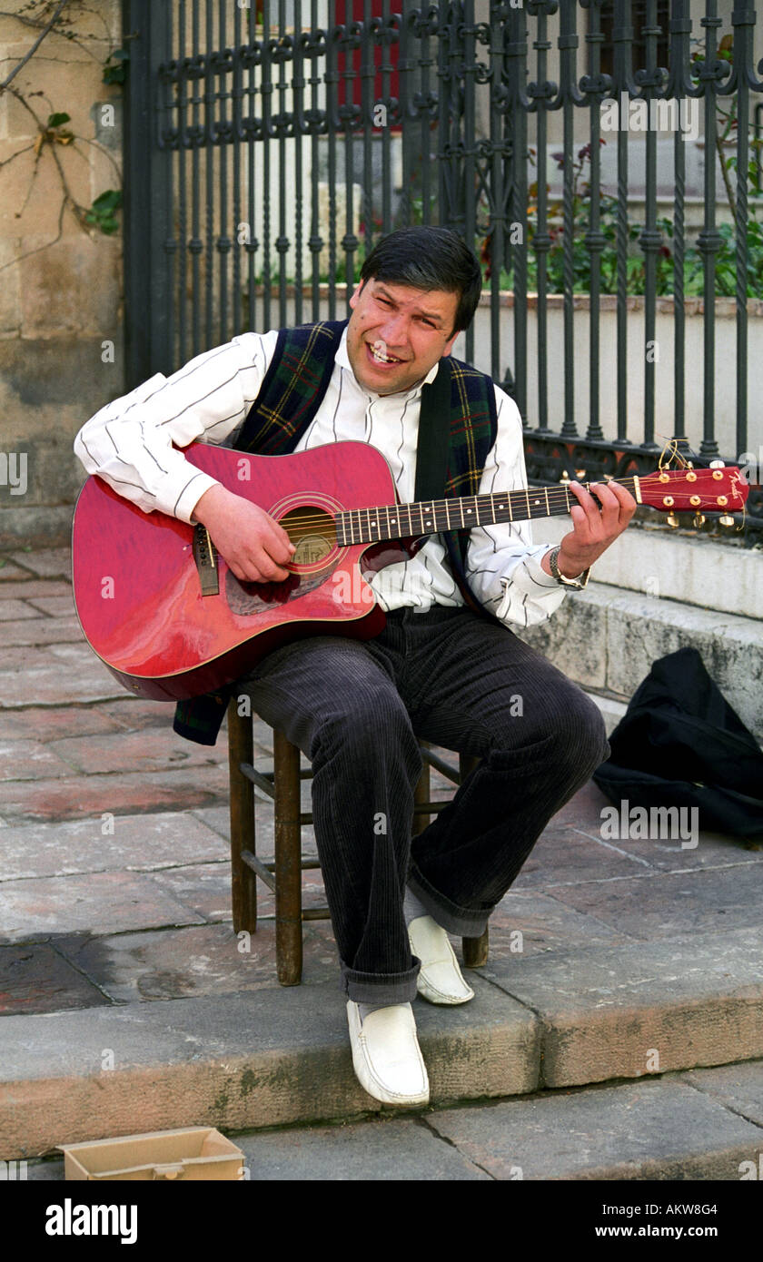 A busker playing spanish guitar in Malaga, Spain Stock Photo Alamy