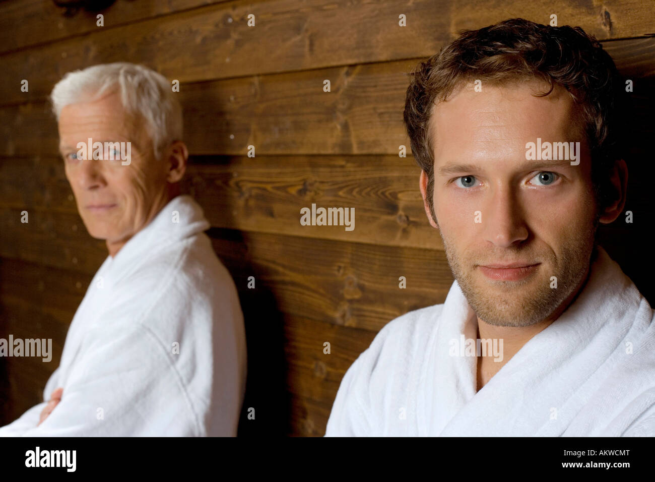 Germany, two men in bathrobe, portrait Stock Photo Alamy