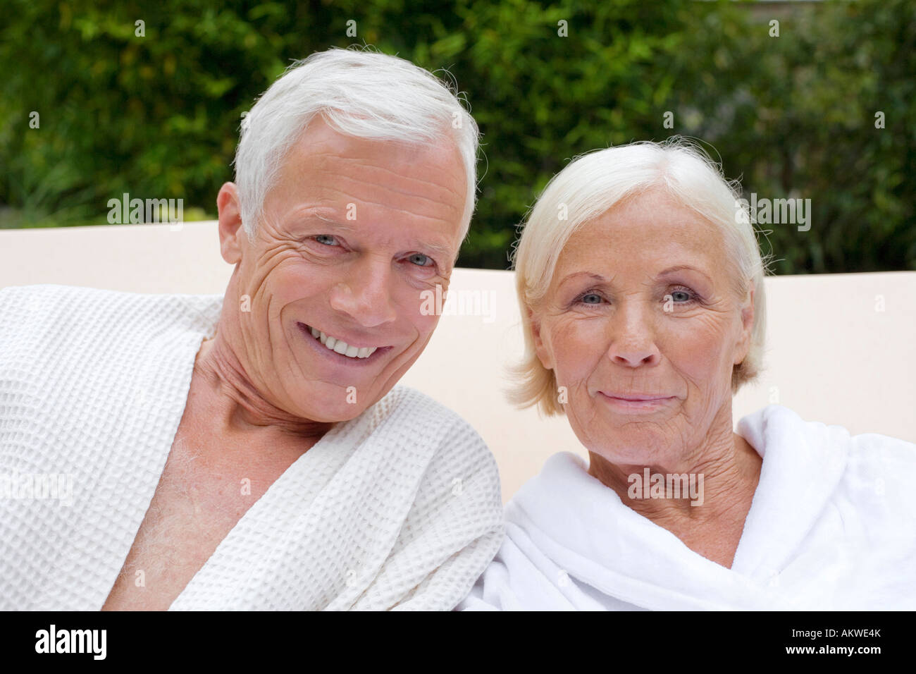 Germany, senior couple wearing bathrobes, closeup Stock Photo Alamy