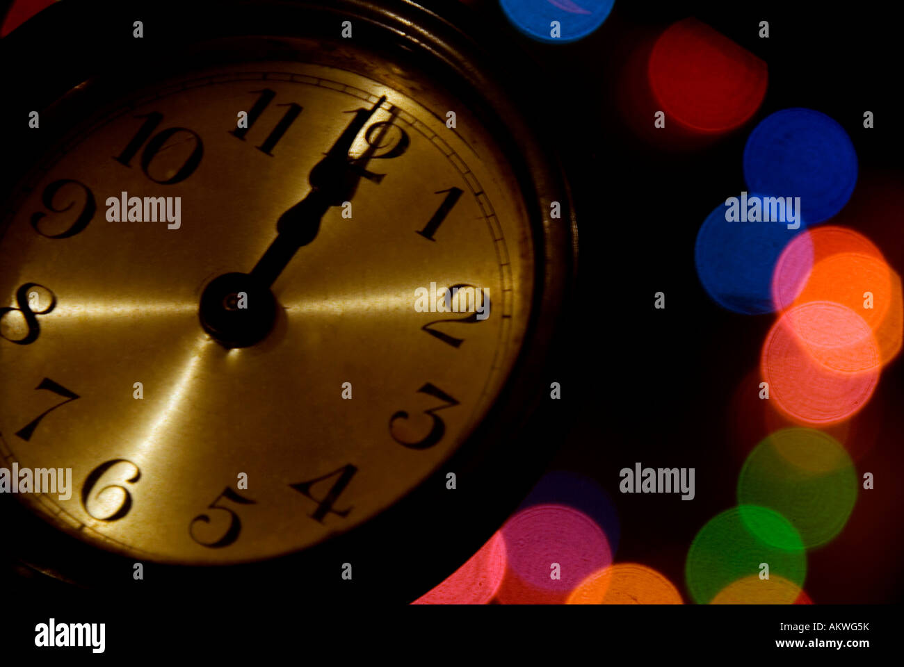 New Year midnight 12 twelve clock lights clockface Stock Photo