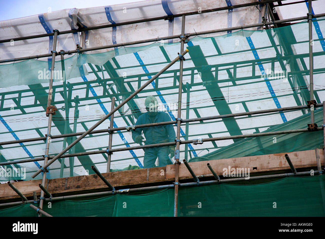 Construction Worker on Scaffolding Industry Wales Stock Photo - Alamy