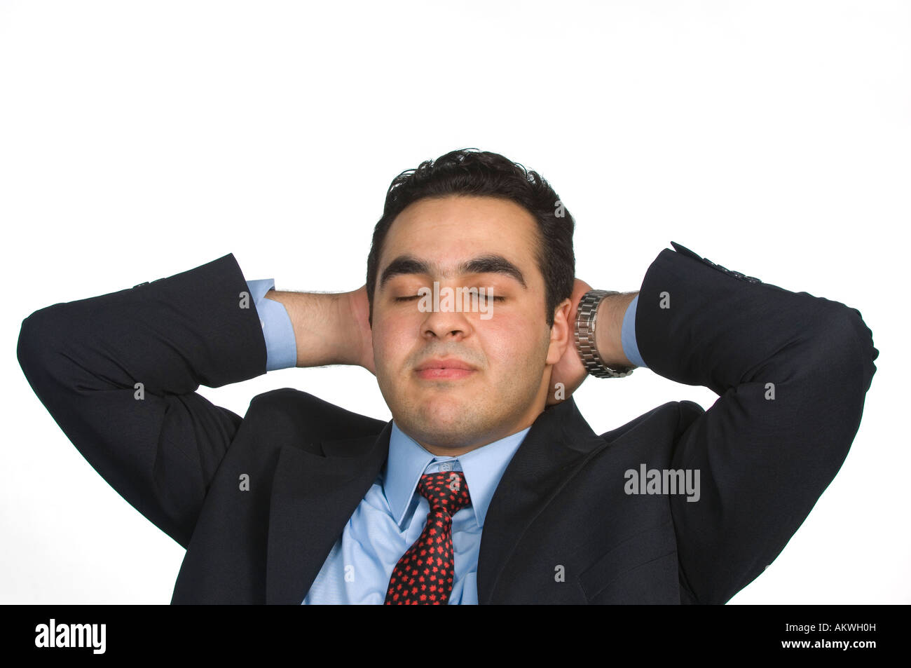Businessman sleeping resting hands behind head Stock Photo Alamy