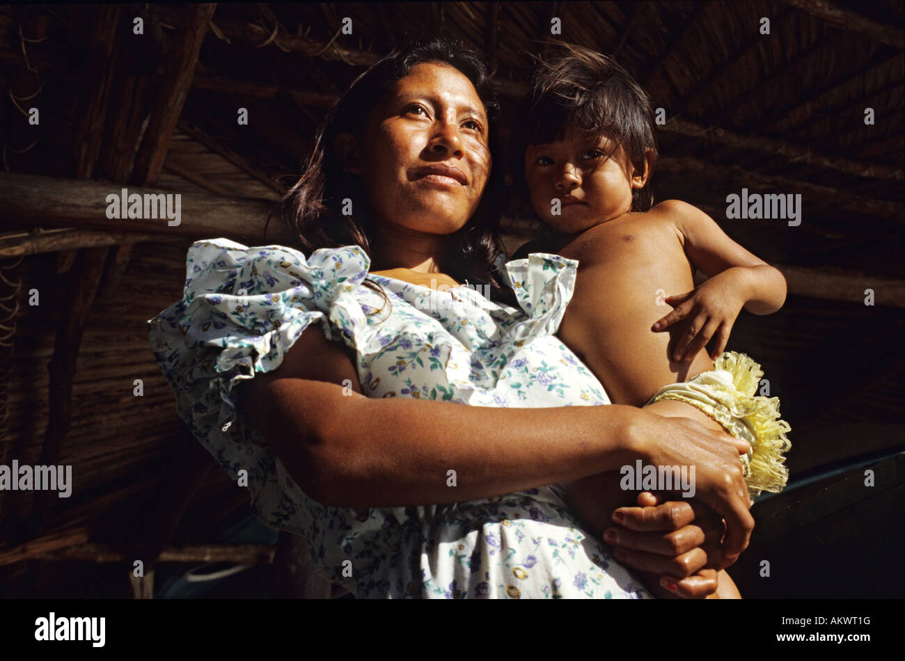 Venezuela, delta of Orinoco River, Manamo River, portrait of Warao Indian and her baby Stock Photo