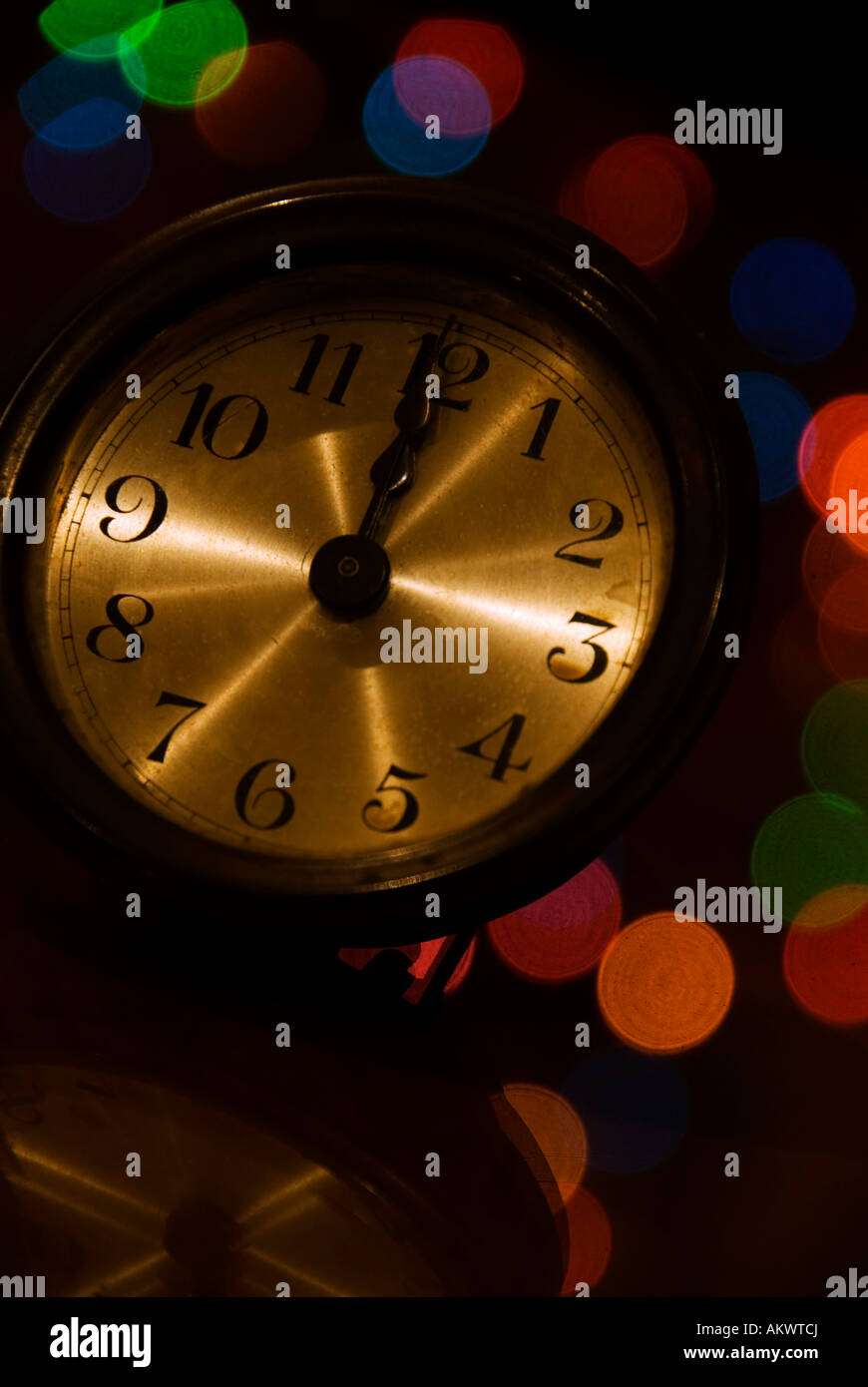 New Year midnight 12 twelve clock lights clockface Stock Photo